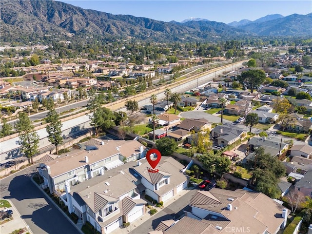 drone / aerial view with a residential view and a mountain view