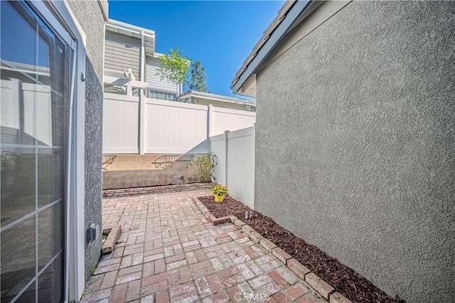 view of patio / terrace with fence