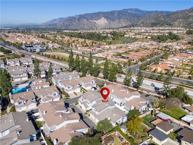 bird's eye view with a residential view and a mountain view