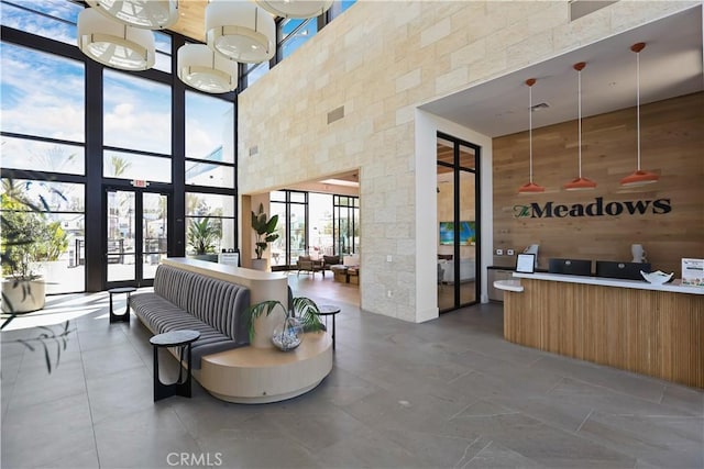 reception area featuring visible vents and french doors