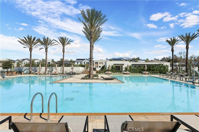 pool featuring a patio area