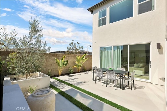 view of patio with fence