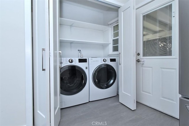 laundry room featuring laundry area and independent washer and dryer