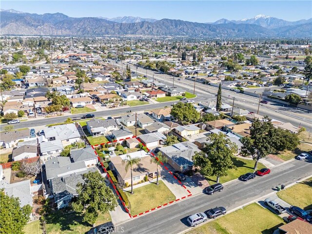 bird's eye view featuring a residential view and a mountain view