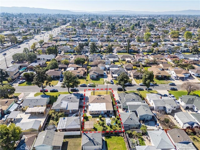 bird's eye view with a residential view and a mountain view