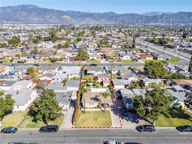 aerial view featuring a residential view and a mountain view