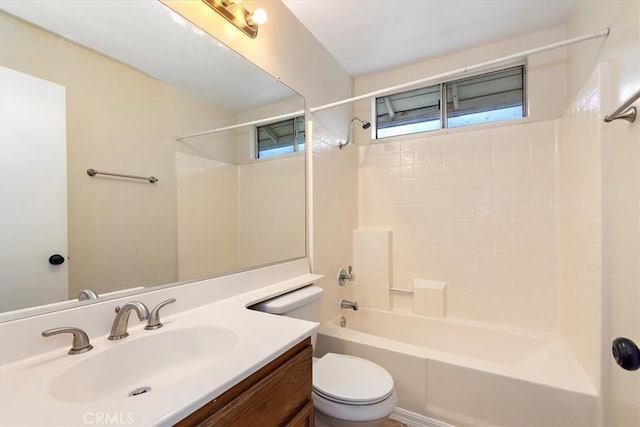 full bathroom featuring toilet,  shower combination, and vanity