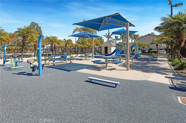 community play area featuring fence