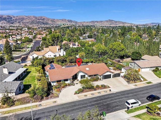 aerial view with a residential view and a mountain view