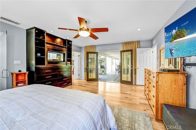 bedroom featuring a ceiling fan, recessed lighting, visible vents, and light wood-style floors