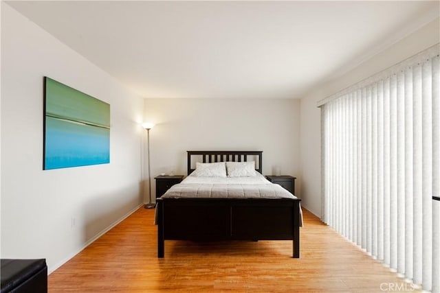 bedroom featuring light wood-type flooring