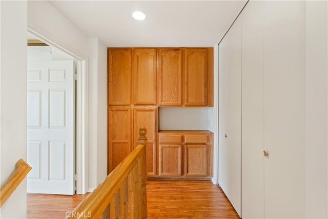 hallway with recessed lighting and light wood finished floors