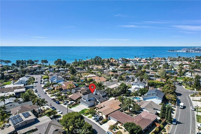 aerial view with a residential view and a water view