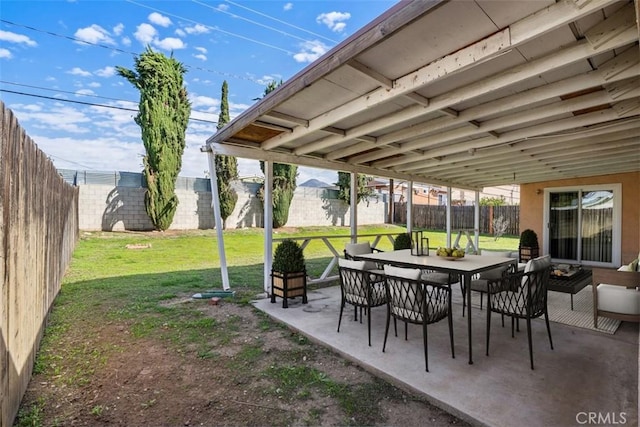 view of patio / terrace with outdoor dining area and a fenced backyard