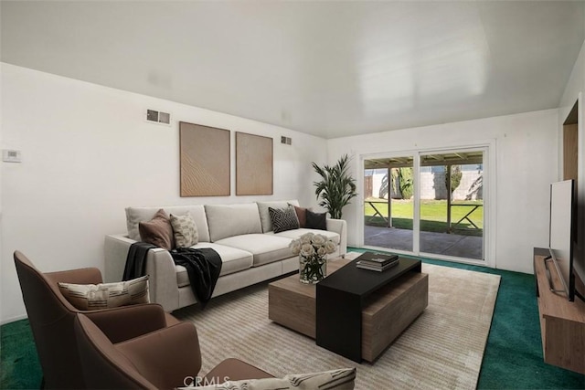 carpeted living room with visible vents