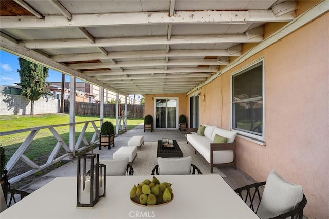 view of patio / terrace featuring fence private yard and an outdoor hangout area