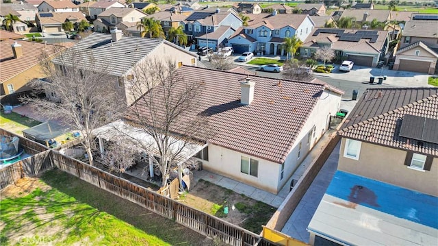 birds eye view of property with a residential view