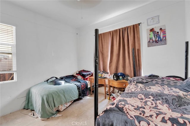 bedroom featuring ceiling fan