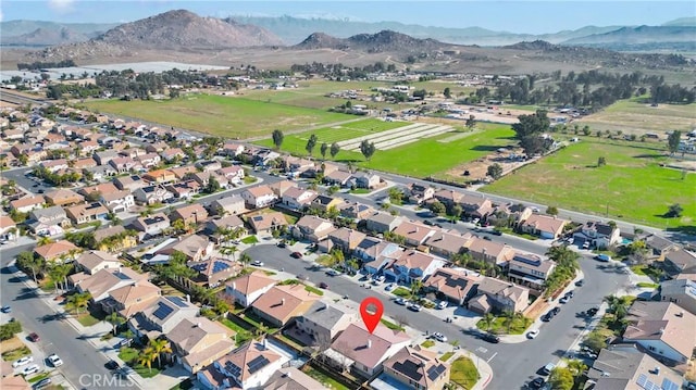 drone / aerial view with a residential view and a mountain view