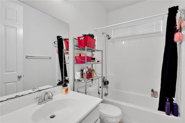 bathroom with toilet, shower / bathtub combination with curtain, and vanity