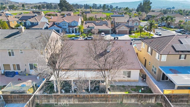 birds eye view of property featuring a residential view and a mountain view