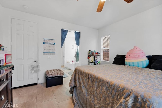 bedroom with a ceiling fan and light tile patterned flooring