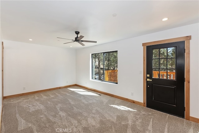 carpeted spare room with ceiling fan, recessed lighting, and baseboards