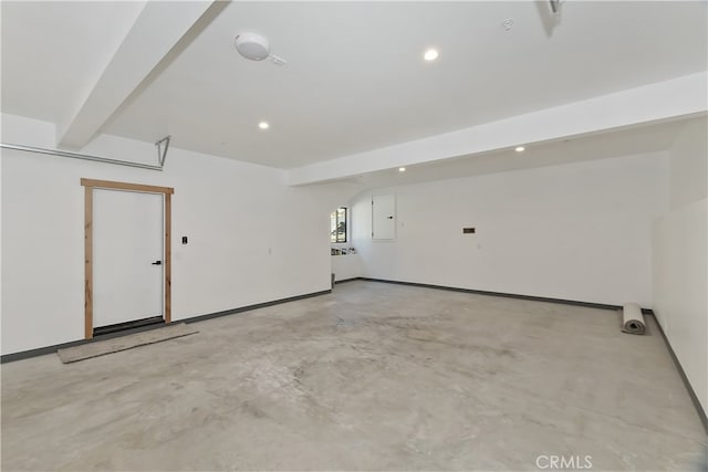 interior space featuring recessed lighting, electric panel, and baseboards