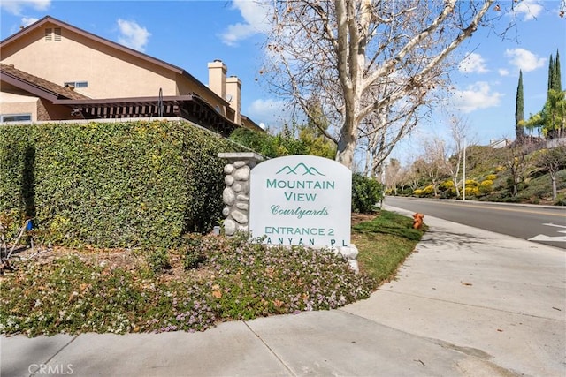 view of community sign