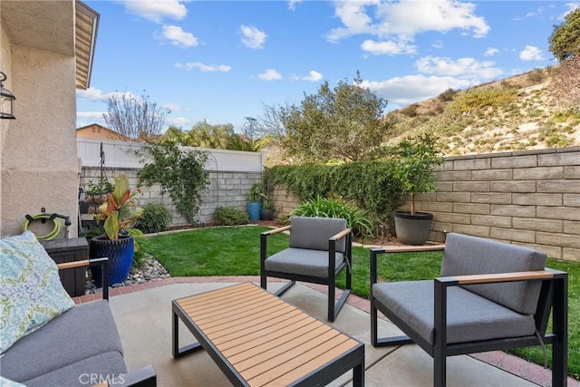 view of patio / terrace with a fenced backyard and outdoor lounge area