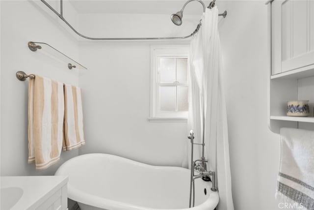 full bathroom with a freestanding tub