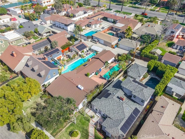 birds eye view of property with a residential view