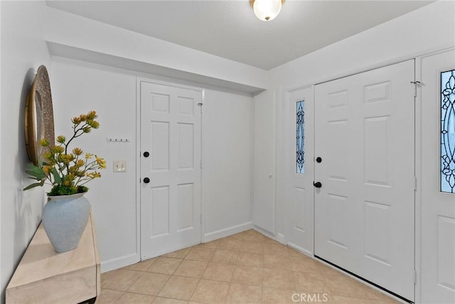 26B Surfside Ave, Surfside, CA 90743 - entryway with light tile patterned flooring and baseboards