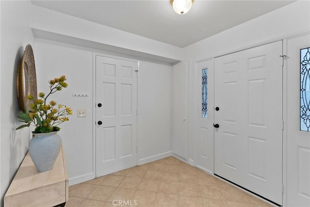 26B Surfside Ave, Surfside, CA 90743 - foyer entrance with light tile patterned flooring and baseboards