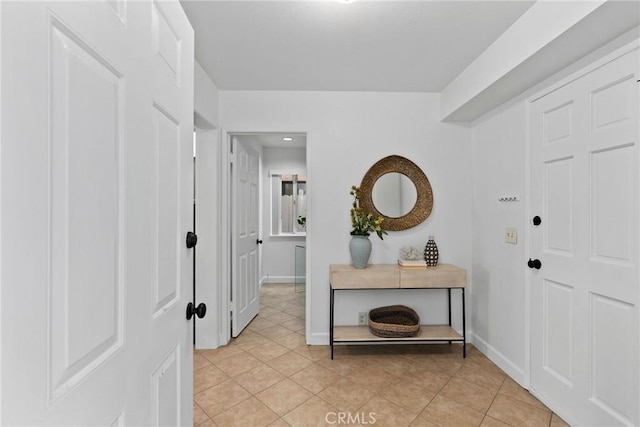 26B Surfside Ave, Surfside, CA 90743 - foyer featuring light tile patterned flooring and baseboards