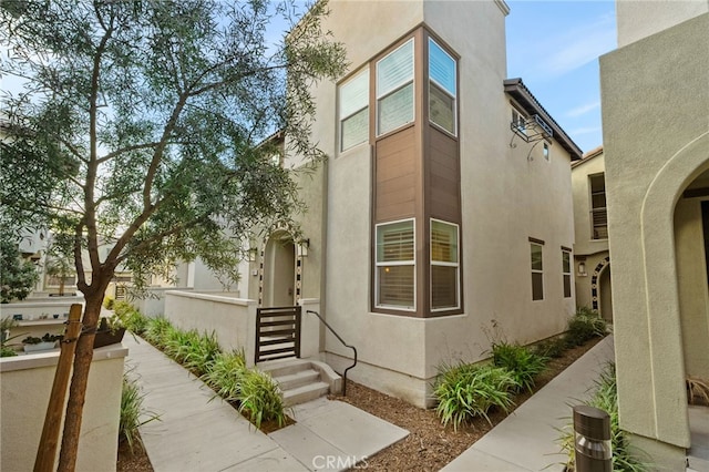 exterior space with stucco siding