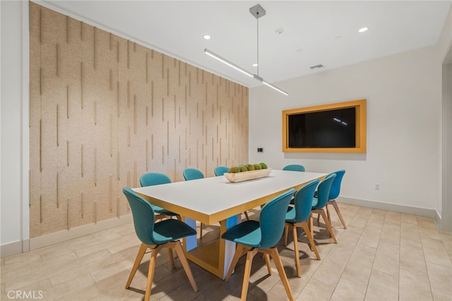 dining space with baseboards, visible vents, and recessed lighting