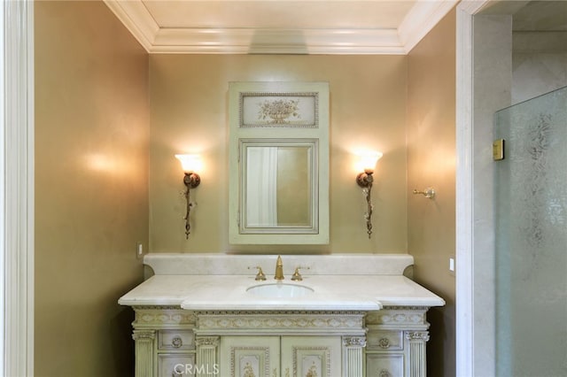 bathroom with ornamental molding and vanity