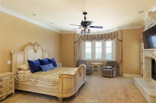 bedroom with baseboards, a ceiling fan, light colored carpet, crown molding, and a high end fireplace