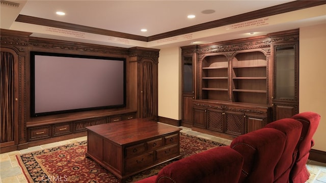 cinema with crown molding, recessed lighting, visible vents, stone finish flooring, and baseboards