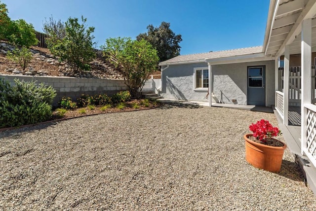 view of yard featuring a patio area and fence