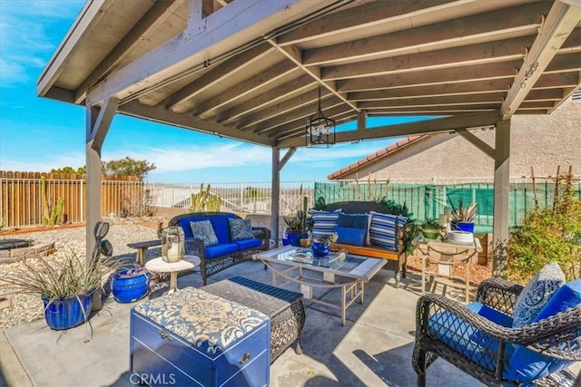 view of patio / terrace featuring a fenced backyard and an outdoor living space