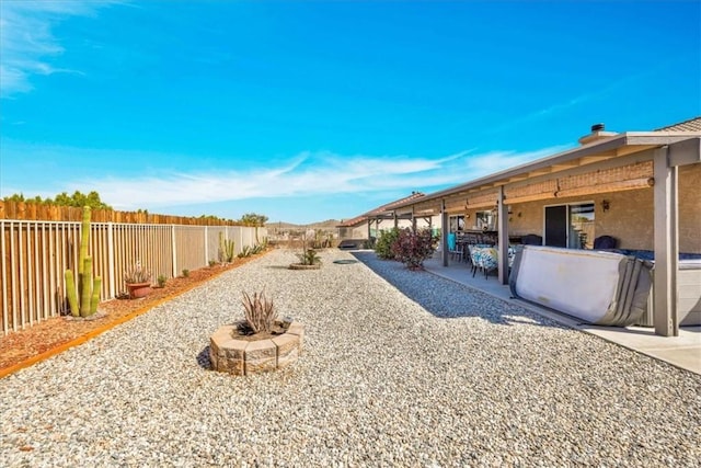 view of yard featuring a patio area and a fenced backyard