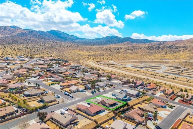 bird's eye view with a residential view and a mountain view