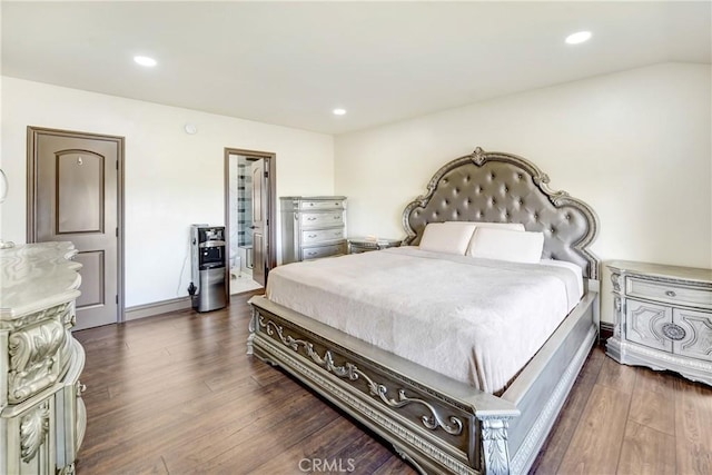 bedroom with baseboards, dark wood-style flooring, and recessed lighting