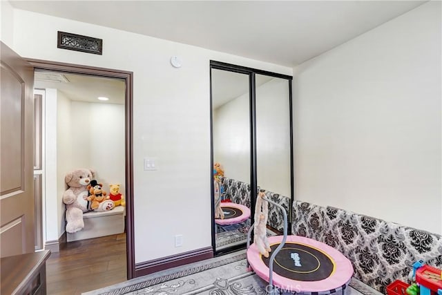 playroom featuring wood finished floors