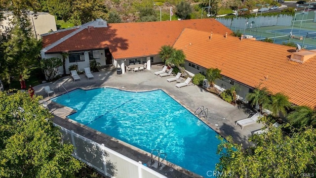 community pool featuring a patio