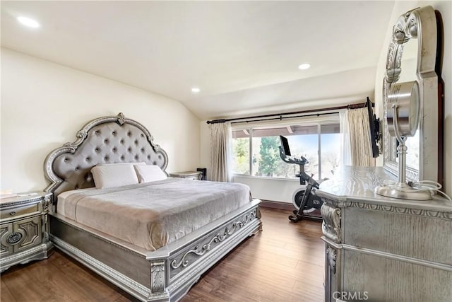 bedroom featuring recessed lighting, vaulted ceiling, and dark wood finished floors