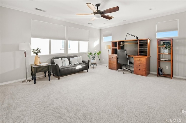 office space featuring ornamental molding, visible vents, and light carpet