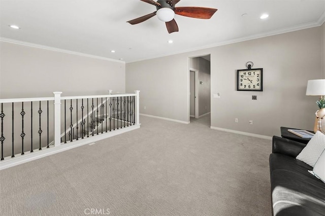 unfurnished living room with carpet floors, crown molding, recessed lighting, ceiling fan, and baseboards